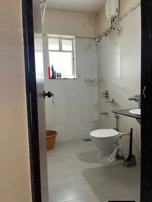 Bathroom in 1 BHK Apartment at Om Krishna Kamal Serenity, Wagholi – for Rent