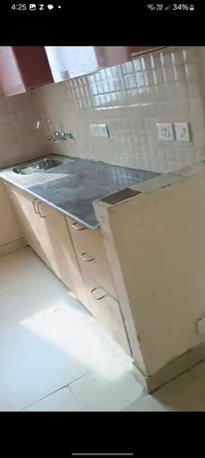 Kitchen in 1 BHK Apartment at Amrapali Dream Valley, Tech Zone 4 Greater Noida – for Rent