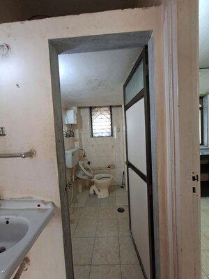 Bathroom in 2 BHK Apartment at Anand Heritage, Dahisar West – for Rent