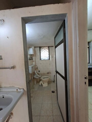 Bathroom in 2 BHK Apartment at Anand Heritage, Dahisar West – for Rent
