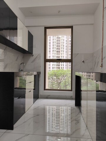 Kitchen in 1 BHK Apartment at Raymond Ten X Habitat, Pokhran Road No Two – for Sale