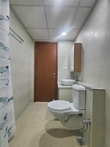 Bathroom in  Apartment at Bhartiya Nikoo Homes Phase 2, Thanisandra Main Road – for Rent