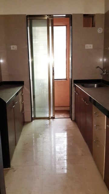 Kitchen in 2 BHK Apartment at D V Shree Shashwat, Mira Road – for Sale