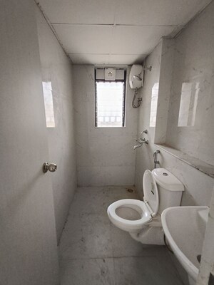 Bathroom in 1 BHK Apartment at Runwal Gardens, Dombivli East – for Rent