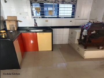 Kitchen in 1 BHK Apartment at Om Krishna Kamal Serenity, Wagholi – for Rent