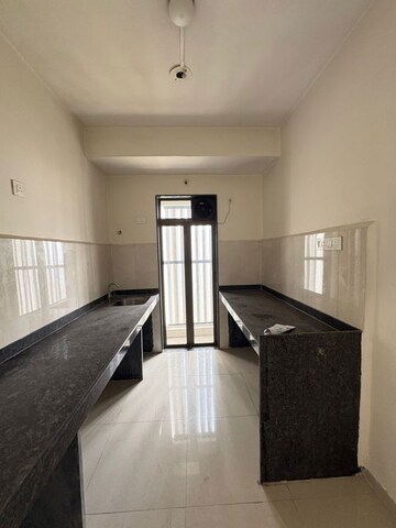 Building Lobby in 2 BHK Apartment at Runwal Gardens Phase 2, Dombivli East – for Rent