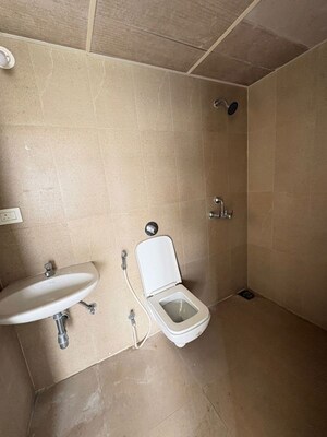 Bathroom in 2 BHK Apartment at Runwal Gardens Phase 2, Dombivli East – for Rent