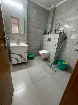 Bathroom in 3 BHK Builder Floor at Rajpur Khurd Extension – for Sale