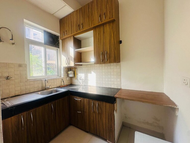 Kitchen, bptp-park-elite-premium 3 Bedroom 1000 Sq.Ft. Apartment In Sector 84 Faridabad 9854735