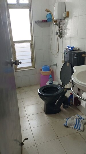 Bathroom in 2 BHK Apartment at Lokhandwala Galaxy, Byculla – for Sale