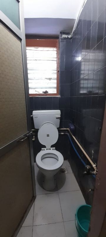 Bathroom in 2 BHK Apartment at Gokul Nagari CHS, Kandivali West – for Rent