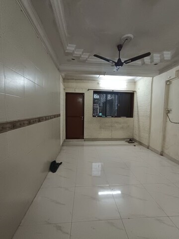 Living Room in 1 RK Apartment at Gokul Nandanvan CHS, Andheri East – for Rent