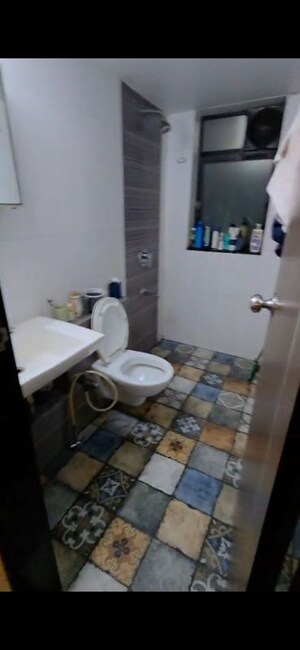 Bathroom in 2 BHK Apartment at Accord Nidhi, Malad West – for Sale