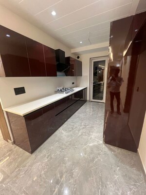 Kitchen in 4 BHK Apartment at Ansal API Esencia, Sector 67 – for Sale