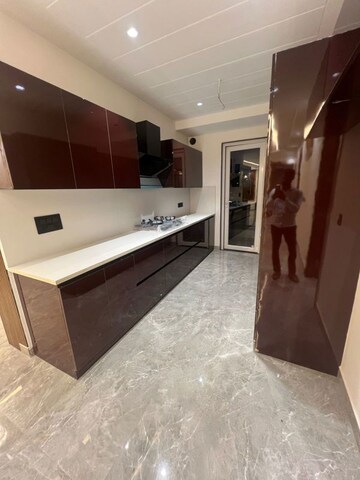 Kitchen in 4 BHK Apartment at Ansal API Esencia, Sector 67 – for Sale