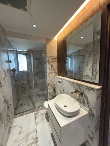 Bathroom in 4 BHK Builder Floor at Nirvana Country – for Sale