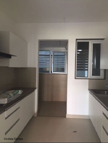 Kitchen in 1 BHK Apartment at Naiknavare Gardenia Society Phase 1, Wadgaon Sheri – for Rent