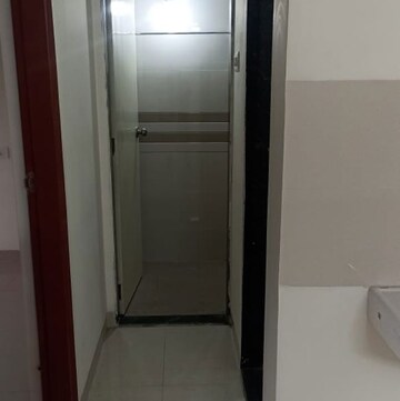 Bathroom in 1 BHK Apartment at Nilanjali CHS, Nagar Road – for Rent