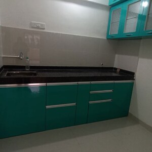 Furnished Amenities in 1 BHK Apartment at Nilanjali CHS, Nagar Road – for Rent