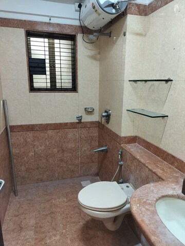 Bathroom in 4 BHK Apartment at Aditya Kutir Apartment, Khar West – for Sale