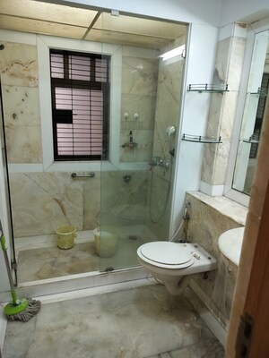 Bathroom in 4 BHK Apartment at Aditya Kutir Apartment, Khar West – for Sale