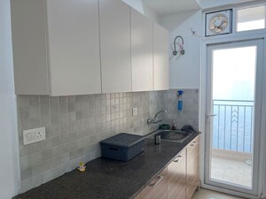 Kitchen in 3 BHK Apartment at ATS Homekraft Pious Hideaways, Sector 150 – for Rent