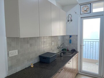 Kitchen in 3 BHK Apartment at ATS Homekraft Pious Hideaways, Sector 150 – for Rent