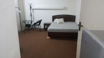 Team Area in Studio Apartment at Defence Colony – for Rent