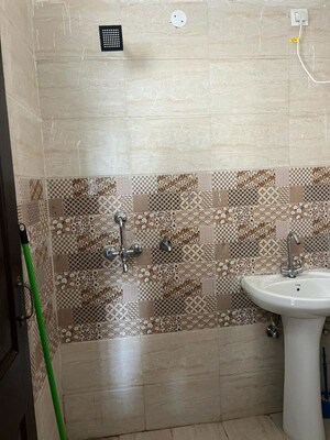 Bathroom in 2 BHK Builder Floor at Shri Devaji Residency, Dhakoli – for Rent