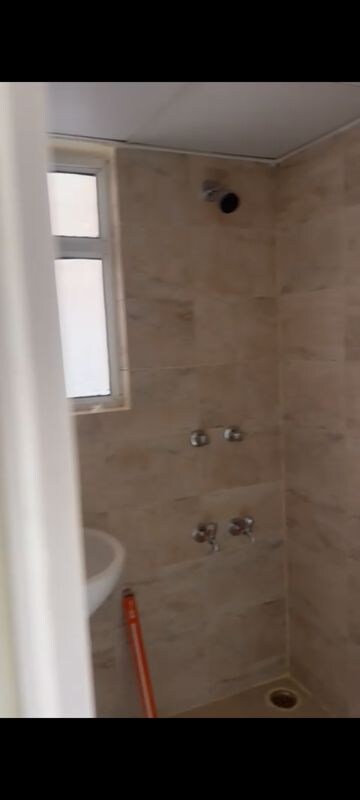 Bathroom in 1 BHK Apartment at Wave Dream Homes, Wave City – for Rent