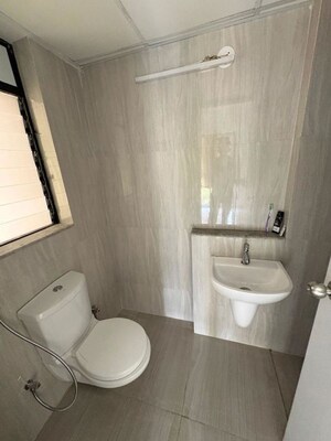 Bathroom in 1 BHK Apartment at Runwal Gardens Phase 2, Dombivli East – for Rent