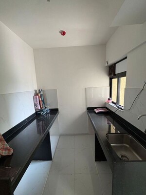 Kitchen in 1 BHK Apartment at Runwal Gardens Phase 2, Dombivli East – for Rent