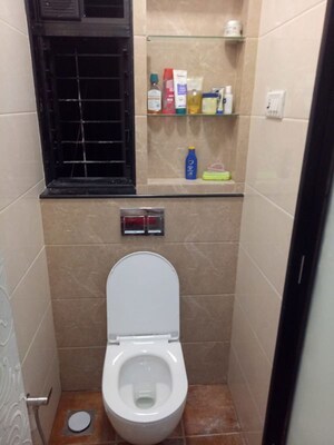 Bathroom in 1 BHK Apartment at Veena Lokpuram CHS, Manpada – for Sale