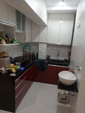 Kitchen in 1 BHK Apartment at Veena Lokpuram CHS, Manpada – for Sale