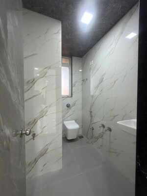 Bathroom in 4 BHK Apartment at Shapoorji Pallonji Siennaa, Kandivali East – for Sale