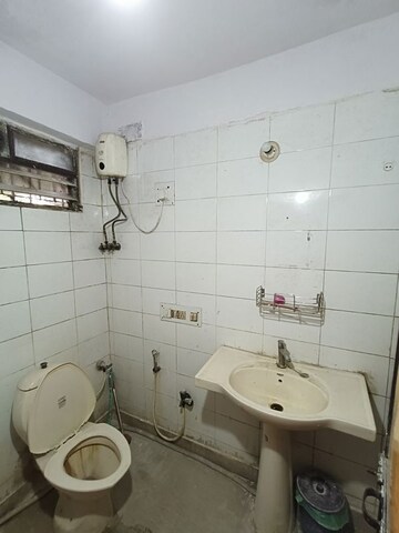Bathroom in 2 BHK Apartment at Shree Amit Nagar CHS, Andheri West – for Rent