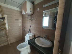 Bathroom in 3 BHK Apartment at Amrapali Crystal Homes, Sector 76 – for Rent