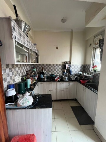 Kitchen in 4 BHK Apartment at Amrapali Heartbeat City, Sector 107 – for Rent