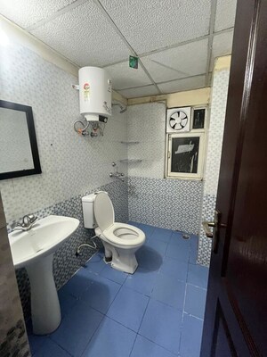 Bathroom in 3 BHK Apartment at Aims Golf City, Sector 75 – for Rent
