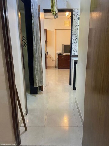 Building Lobby in 1 BHK Apartment at Dosti Acres – for Rent