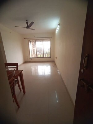 Room in 2 BHK Apartment at Dosti Acres – for Rent