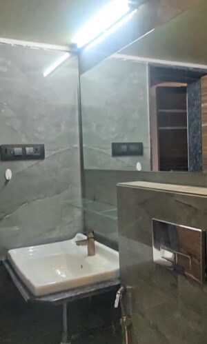 Bathroom in 2 BHK Apartment at Tata Glendale, Vasant Vihar – for Rent