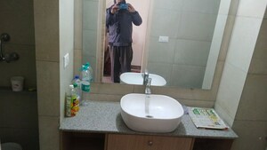 Bathroom in Studio Apartment at Gaur Runway Suites, Gaur Yamuna City – for Rent