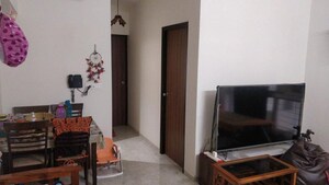 Living Room in 1 BHK Apartment at Lodha Amara, Kolshet Road – for Rent
