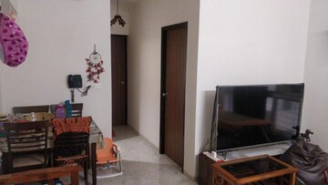 Living Room in 1 BHK Apartment at Lodha Amara, Kolshet Road – for Rent