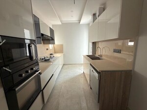 Kitchen in 4 BHK Apartment at Adani Samsara Vilasa, Sector 63 – for Rent