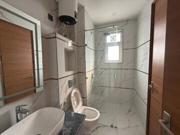 Bathroom in 4 BHK Apartment at Adani Samsara Vilasa, Sector 63 – for Rent