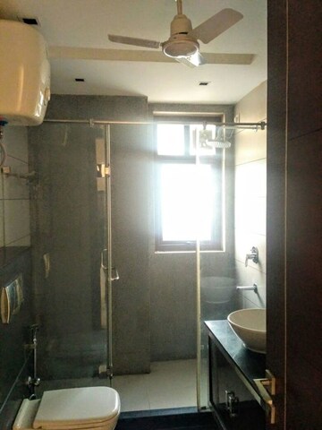 Bathroom in 4 BHK Builder Floor at Defence Colony – for Rent