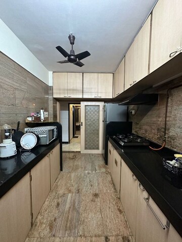 Kitchen in 2.5 BHK Apartment at Bamboo House, Santacruz West – for Rent