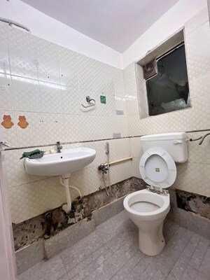 Bathroom in 2 BHK Apartment at Lokhandwala Complex – for Rent